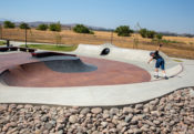 Backside Tail over the ledge at Perris Skatepark bowl