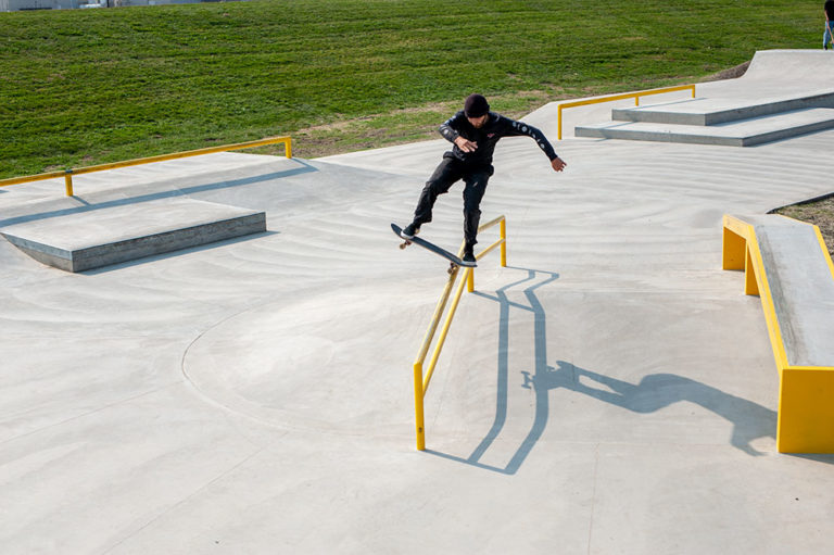 Bluntslide on the A Frame rail located at Waterloo Skatepark Iowa