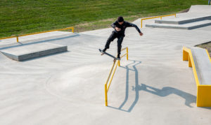 Bluntslide on the A Frame rail located at Waterloo Skatepark Iowa