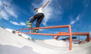 Switch Frontside boardslide handrail at Carrollwood Skatepark, Tampa FL designed and built by Spohn Ranch