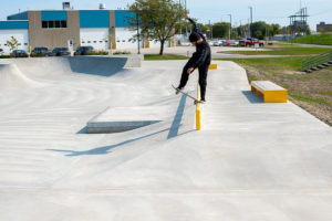 Frontside Blunt of Skateboarder in Waterloo Skatepark, Iowa Designed and Built by Spohn Ranch