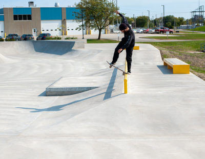 Frontside Blunt of Skateboarder in Waterloo Skatepark, Iowa Designed and Built by Spohn Ranch