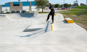 Frontside Blunt of Skateboarder in Waterloo Skatepark, Iowa Designed and Built by Spohn Ranch