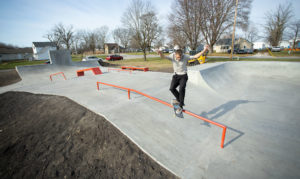 Designed and Built by Spohn Ranch showcases a frontside feeble skateboard trick in Gibson City