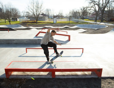 A super fast frontside 5.0 on the flat skatepark ledge at Gibson City Skatepark designed and built by Spohn Ranch