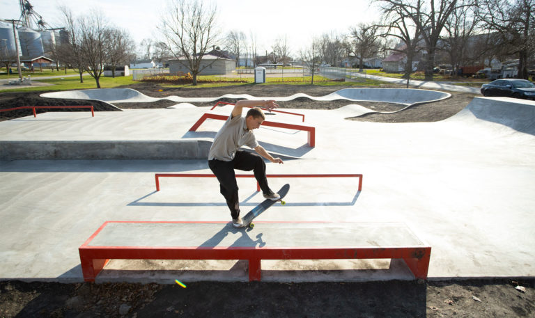 A super fast frontside 5.0 on the flat skatepark ledge at Gibson City Skatepark designed and built by Spohn Ranch