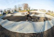 Kickflip on the pump track hips at Ed Day Memorial Skatepark and Pump Track in Gibson City, IL