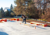 A frontside blunt side at a skatepark filled with Rails, Hubbas, Ledges, Transition, Volcano and tons of shade