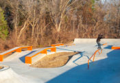 Frontside Feeble skatepark embedded in a forest designed and built by Spohn Ranch Skatepark Company