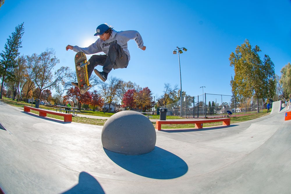 Treflip over the ball at West Des Moines Iowa Skatepark by Spohn Ranch