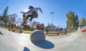 Treflip over the ball at West Des Moines Iowa Skatepark by Spohn Ranch