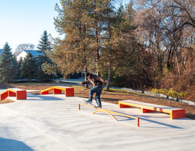 A frontside blunt side at a skatepark filled with Rails, Hubbas, Ledges, Transition, Volcano and tons of shade