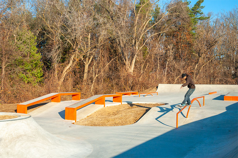 Treelined skatepark in Milford MI, build and designed by Spohn Ranch