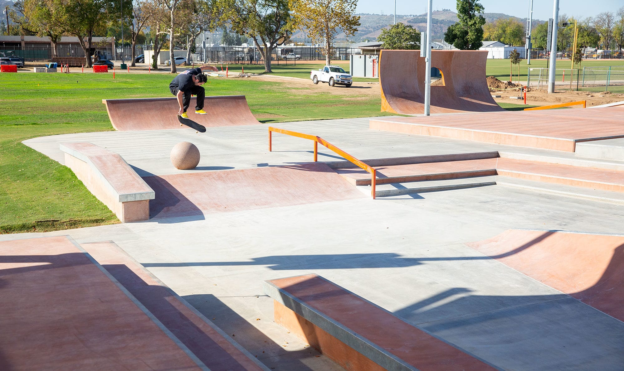 Matt Berger backside flips over a ball at La Puente Skatepark, Designed and Built by Spohn Ranch