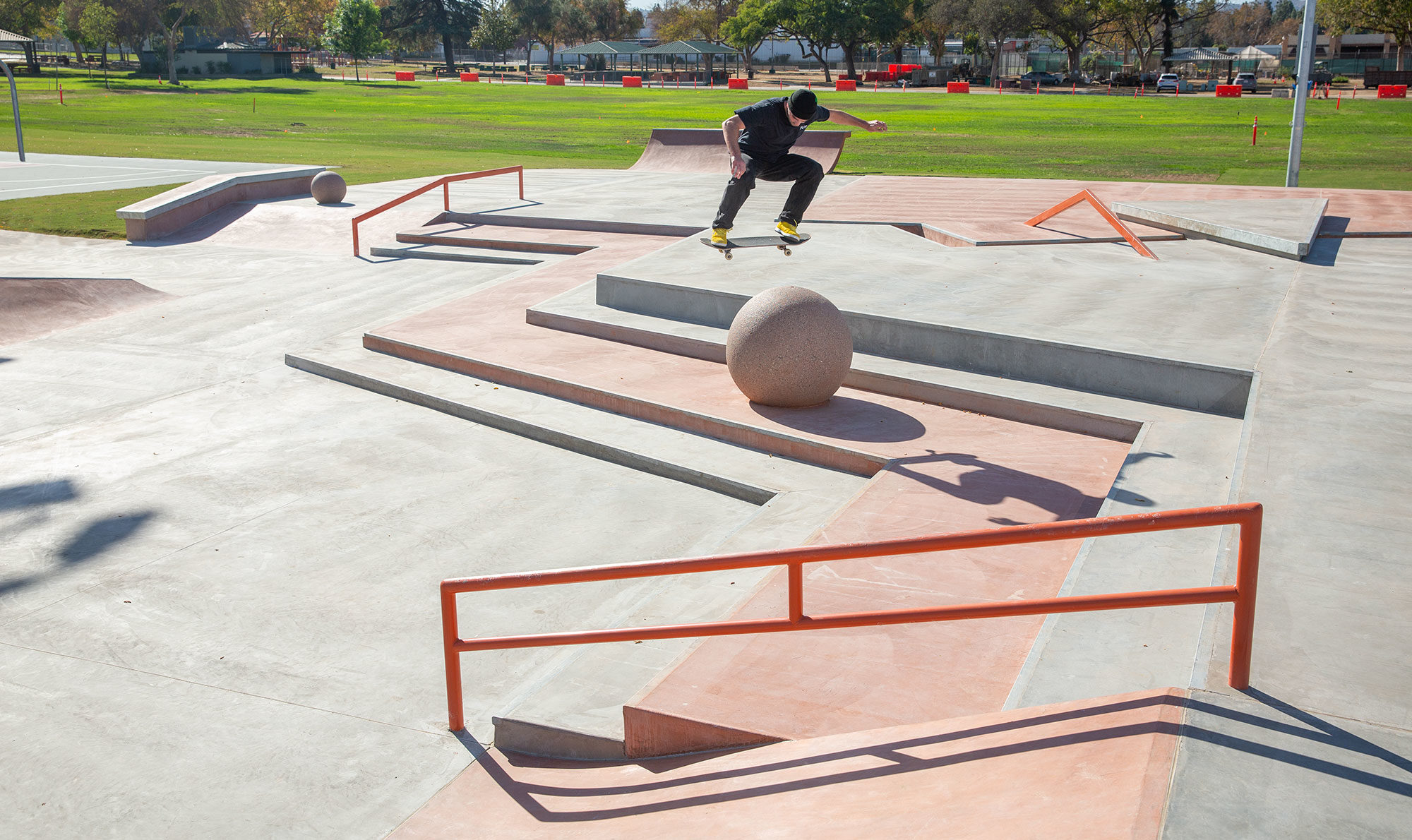 Flip Professional Matt Berger Switch Ollie over a bollard at La Puente Skatepark designed and built by Spohn Ranch