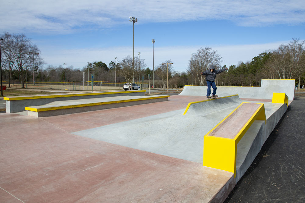 frontside 5050 on the bazooka skatepark rail at Spohn Ranch Skateparks build Mecklenburg Skatepark