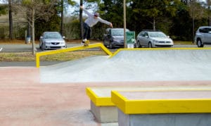 Backside tail on the hubba at the skatepark in North Carolina in Mecklenburg County