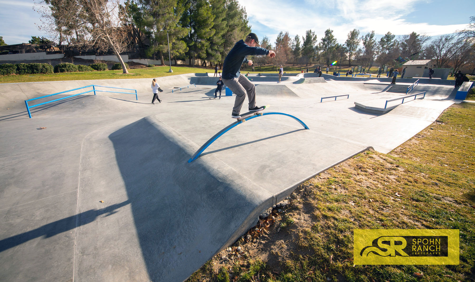 Robby Hargreaves riding the rainbow rail at Victorville Skatepark in CA by designed by Spohn Ranch