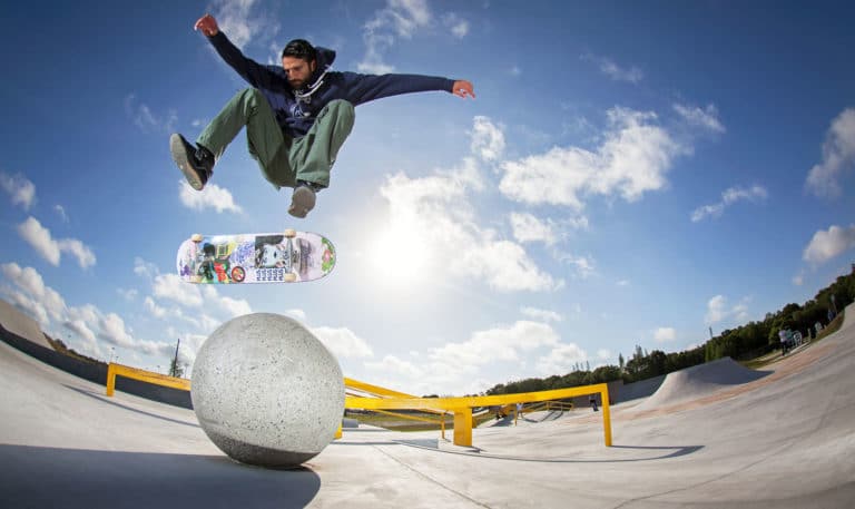 Heelflip over the bollard at Polk Skatepark in Florida