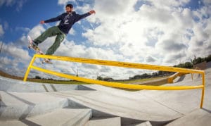 Frontside Boardslide up the handrail at a skatepark in Florida