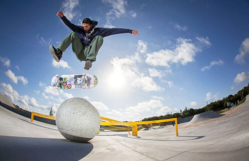 Heelflip over a skatepark bollard at Polk Skatepark in Florida