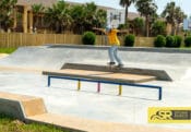 Backside tail across the manny pad by Mikey Whitehouse at South Padre Island Skatepark in Texas