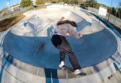 Feeble grind around the pool coping at Allentown Skatepark