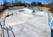 Carving the bowl extention at Spohn Ranch Skatepark design and build at Union City, GA
