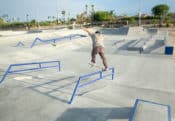 Crooked grind on the handrail at the La Quinta X Skatepark designed and built by Spohn Ranch