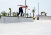 Backside tail on the tall bank to ledge at Panama Beach Florida Skatepark in Bay County