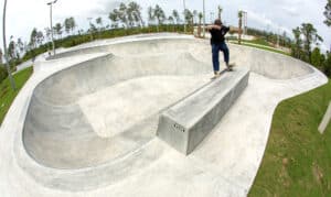Smith grind flow bowl with extension at Panama Beach Florida by newly built Spohn Ranch Skatepark design and build
