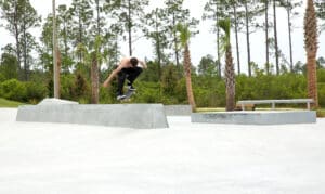 Fatty kickflip over the large bank to wall at Spohn Ranch built in Panama City, Florida at the Bay County Skatepark