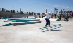 Infamous Dj Runaway with a front board on the Redondo Beach Pier Skatepark.