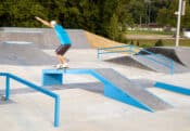Backside 5050 on the hubba at Spohn Ranch's designed and built skatepark in Cottage Grove, WI