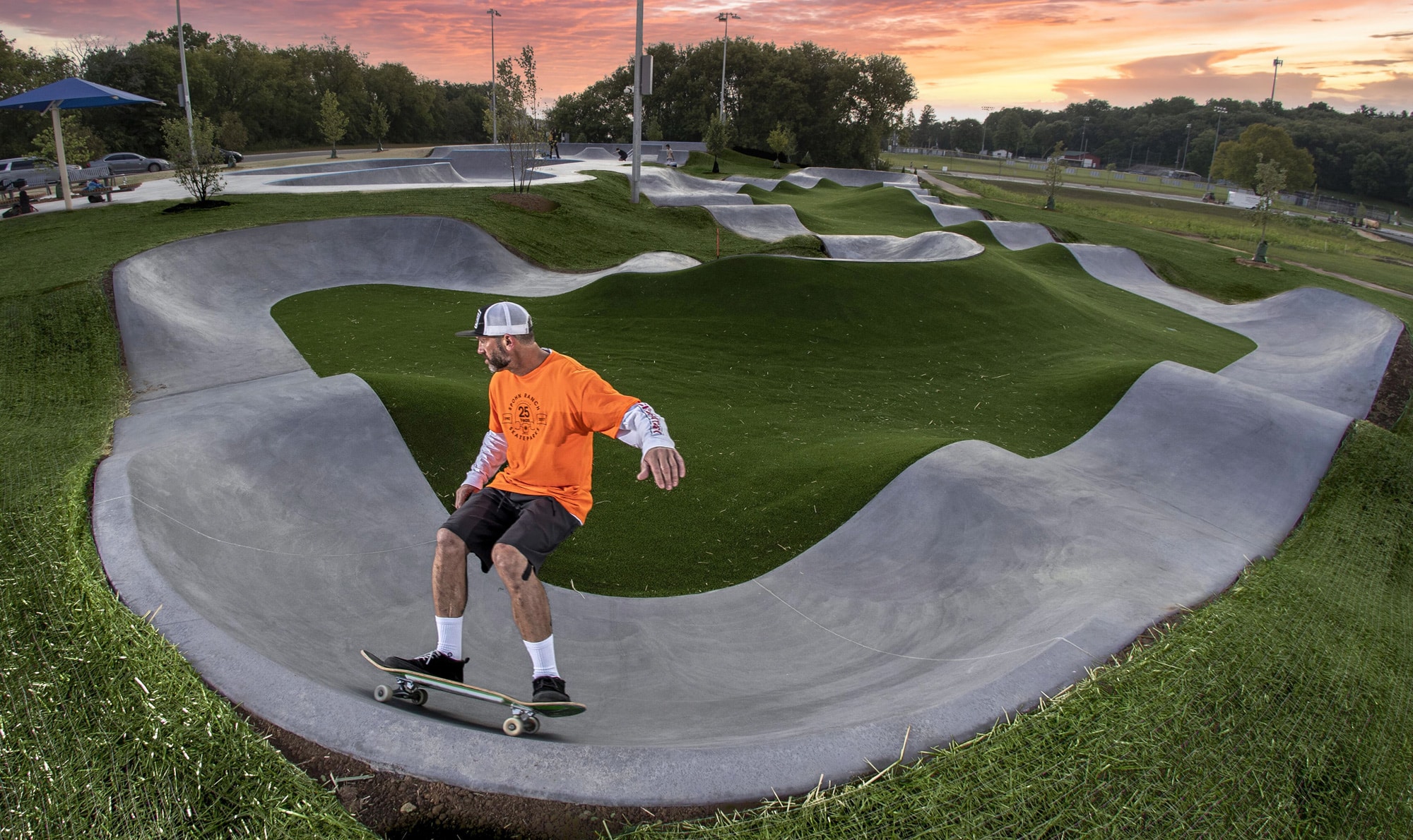 Sunset carve at Spohn Ranch's new pump track located in Cottage Grove, WI